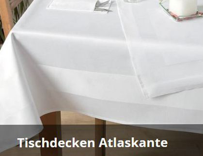 White tablecloths with satin band or